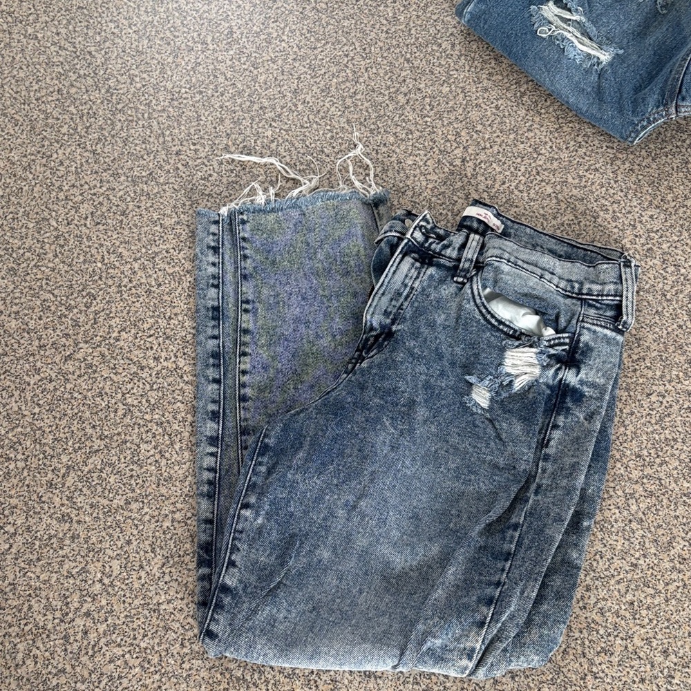 Distressed Blue Jeans